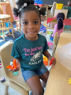 Female Student in Eagles Gear