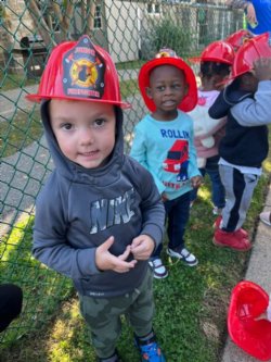 Students in Firefighter hats